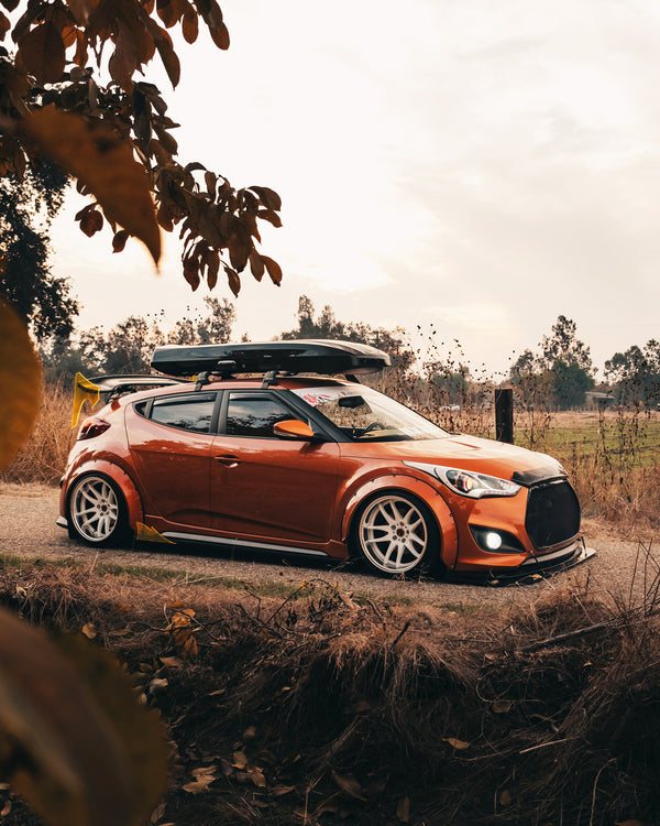 Hyundai Veloster with Clinched New School 7cm (2.8") universal fender flares, front three-quarter view