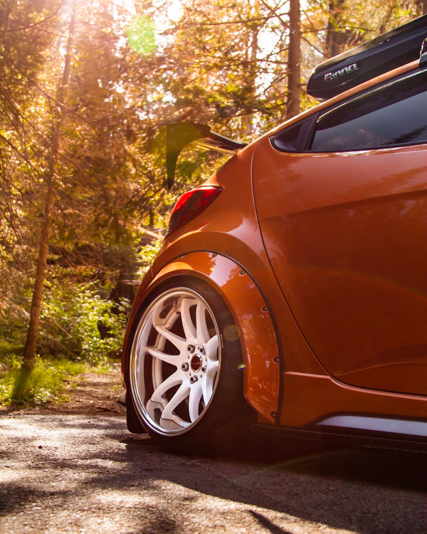 Hyundai Veloster with Clinched New School 7cm (2.8") universal fender flares, rear wheel close-up